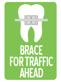 Hill Country Pediatric Dentistry and orthodontics Dental  office sign: Brace For Traffic Ahead showing a tooth with a brace on it white on green background 